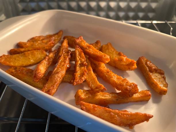 Golden Brown Roasted Potato or Potato Wedges or Fries or Chips Inside the Oven
