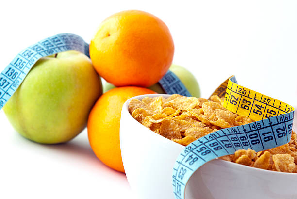 Diet breakfast:  cornflakes, orangs, apples e and a tape