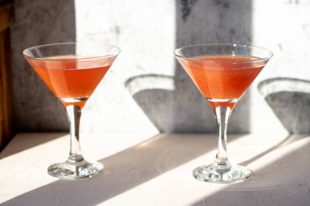 Orange cocktail on gray background